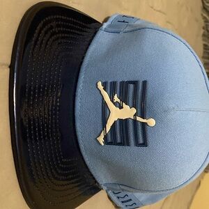 Baby Blue Flat Top Air Jordan Hat. Dark Blue leathered brim. Worn once.